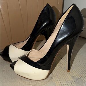 Brand new Aldo Black and Cream Peep-Toe Heels